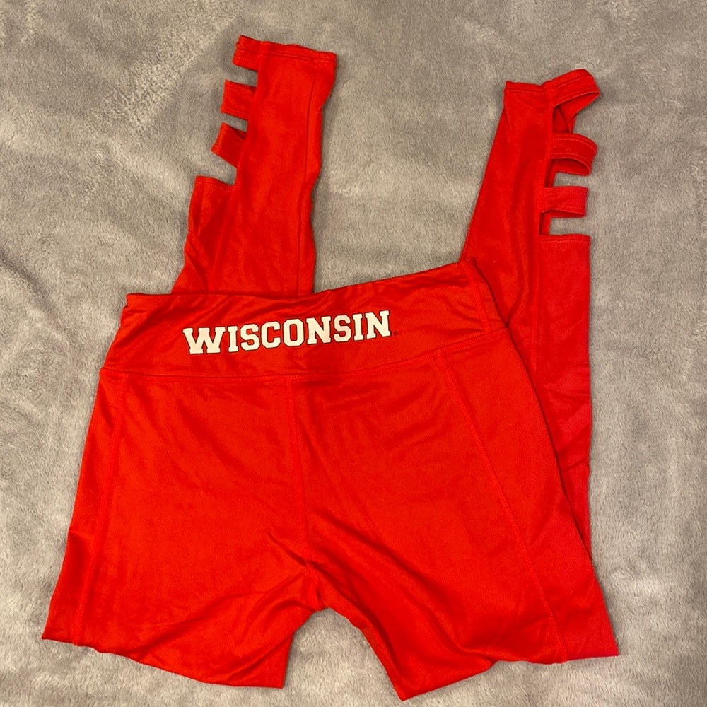 Wisconsin awesome leggings with cutouts on the legs.